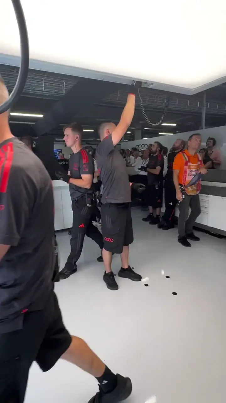 Audi Revolut F1® Team celebrating the qualifying inside the garage at the Hungarian GP 2026