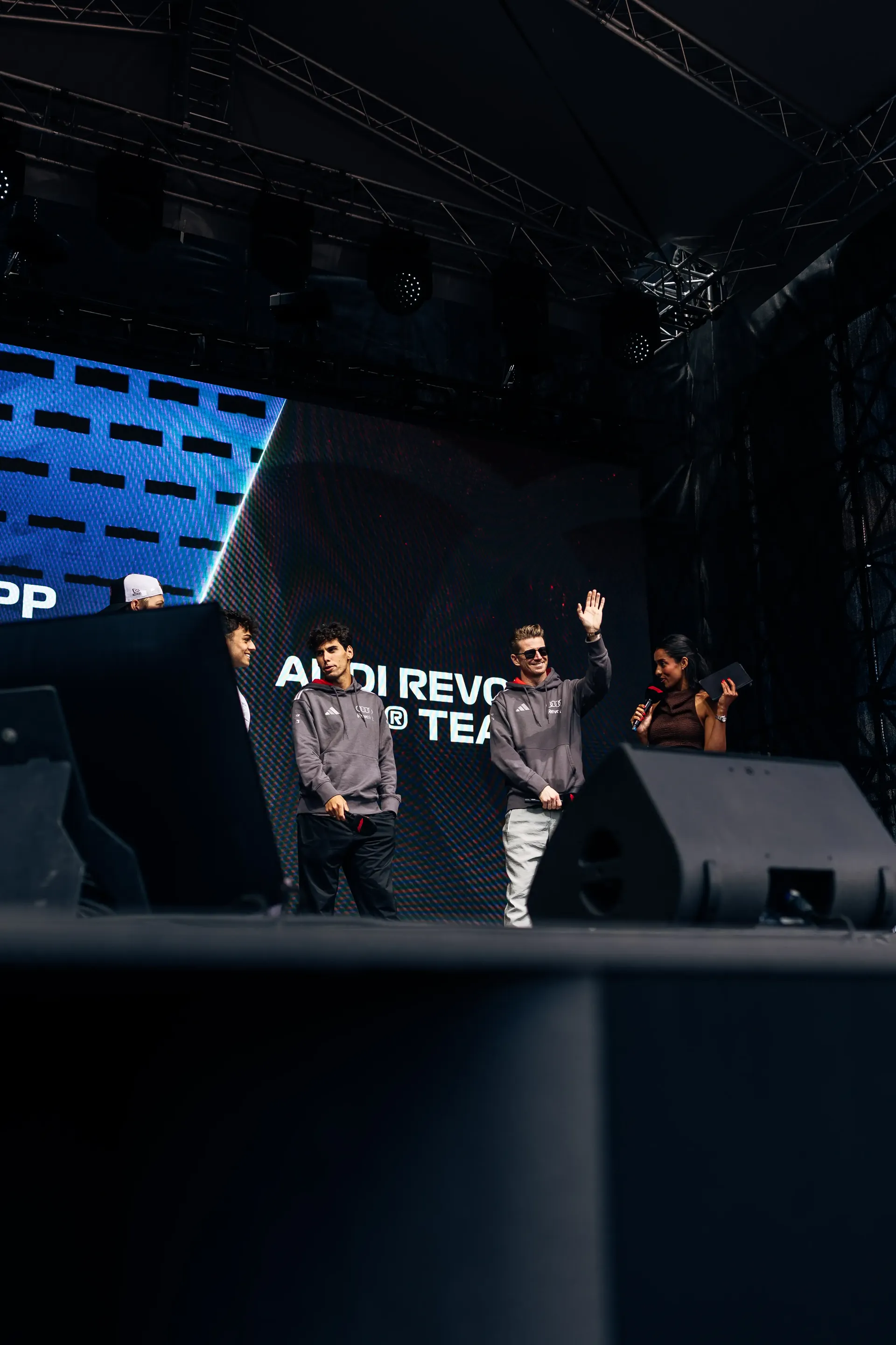 Audi Revolut F1® Team drivers Gabriel Bortoleto and Nico Hulkenberg appear on stage at the Formula 1® Fan Forum in Budapest.