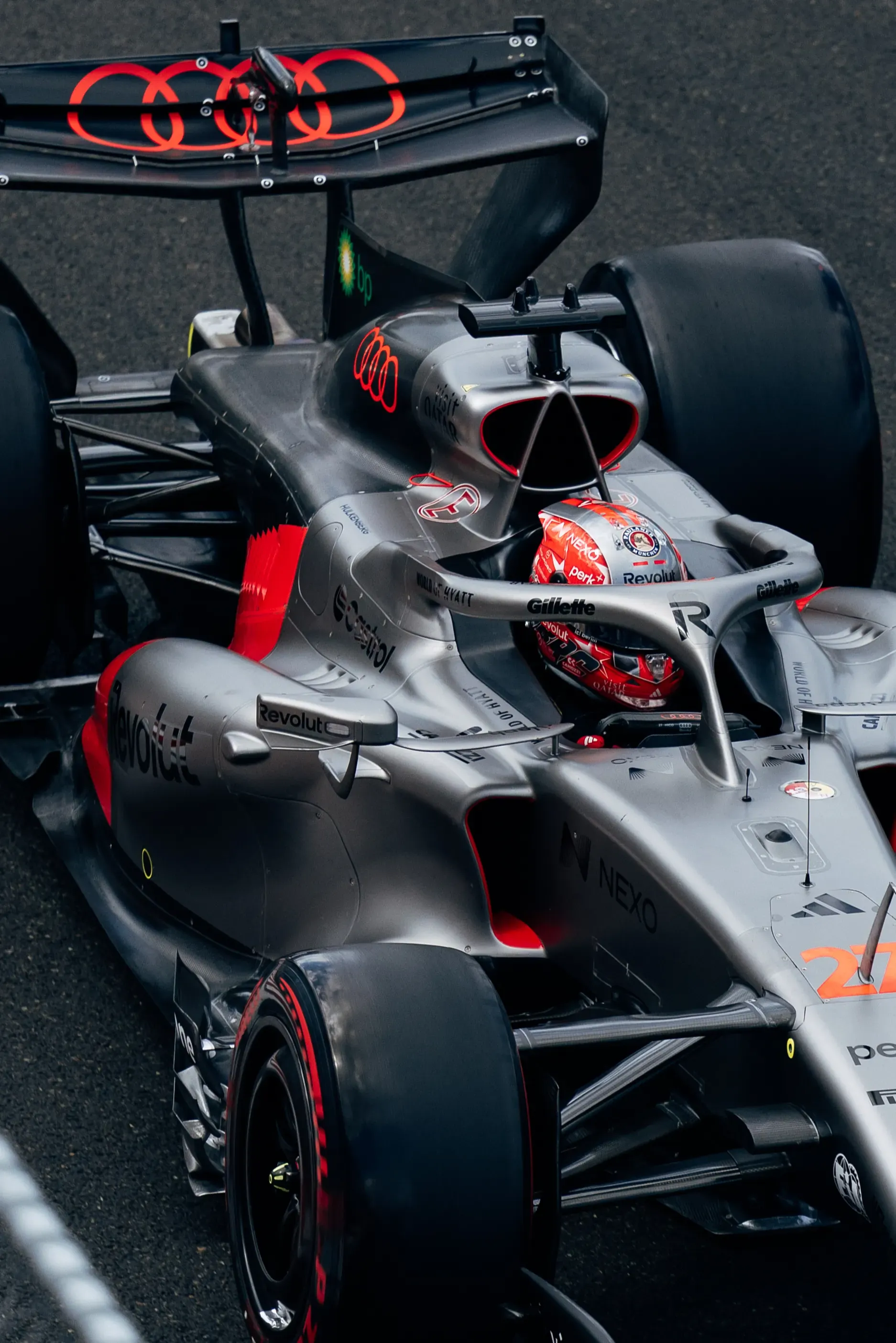The Audi R26 exits the garage during Friday practice at the Hungarian Grand Prix.