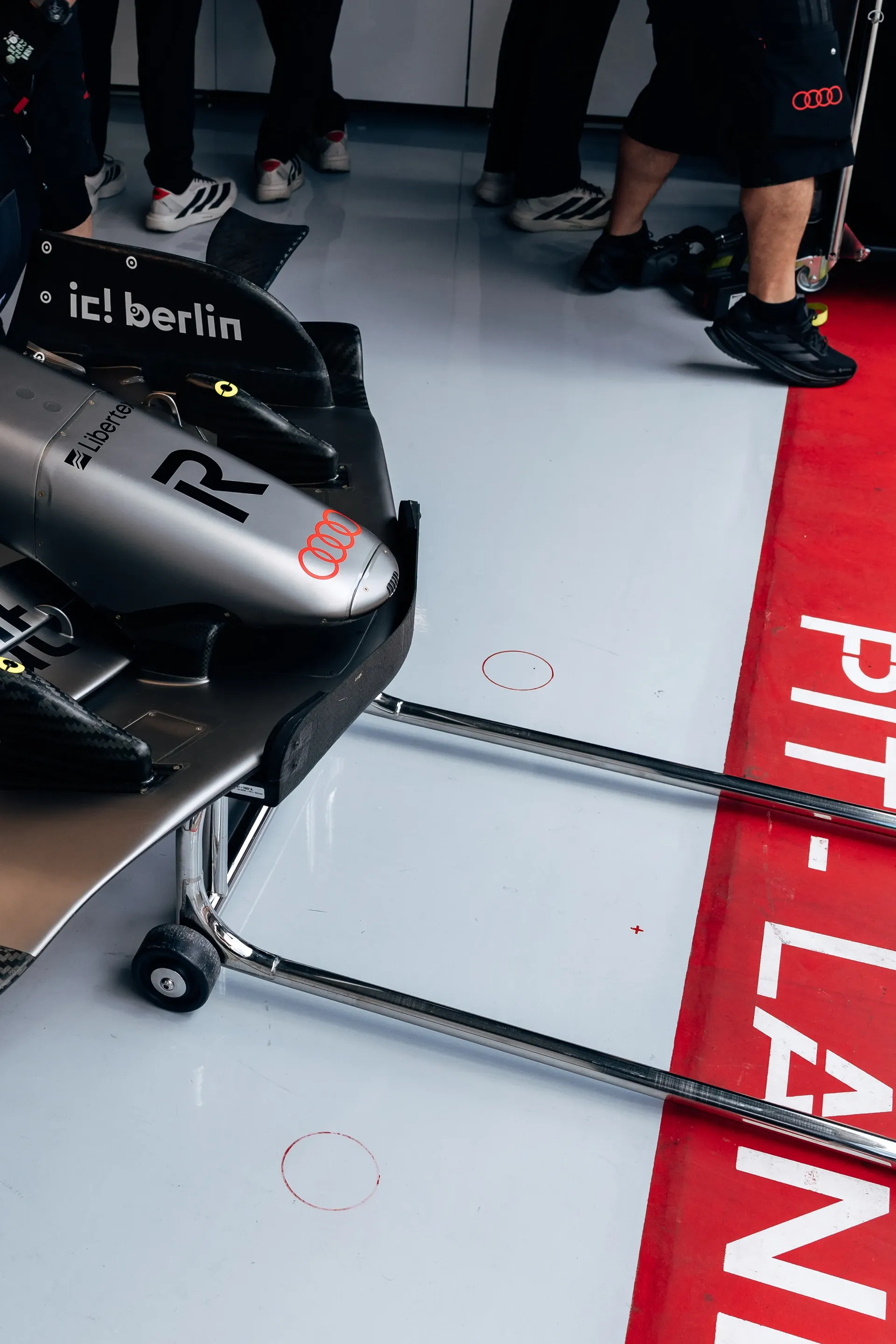 Front wing of the Audi R26 positioned in the Hungaroring pit lane.