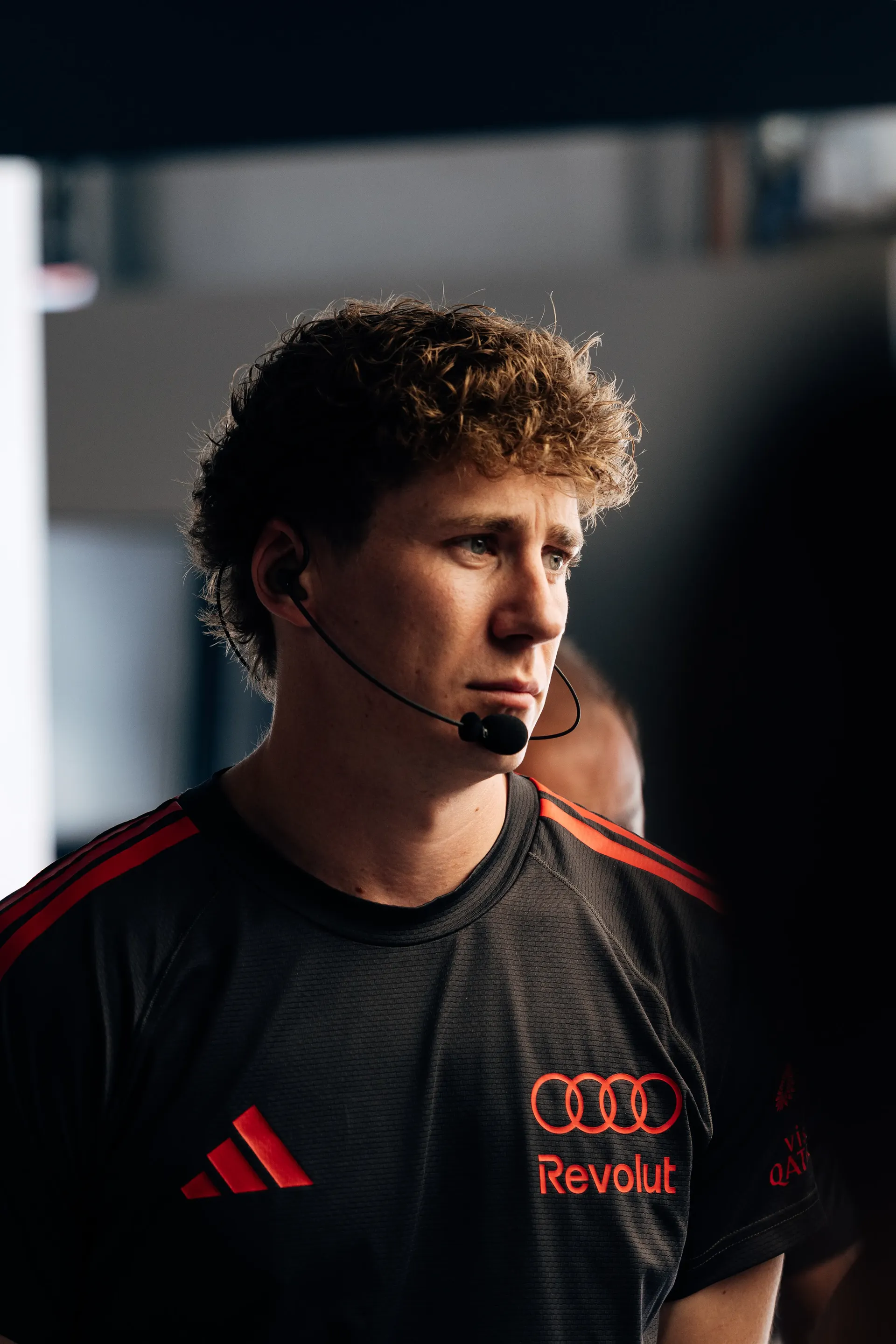 Audi Revolut F1® Team mechanic listens to team radio during FP1.