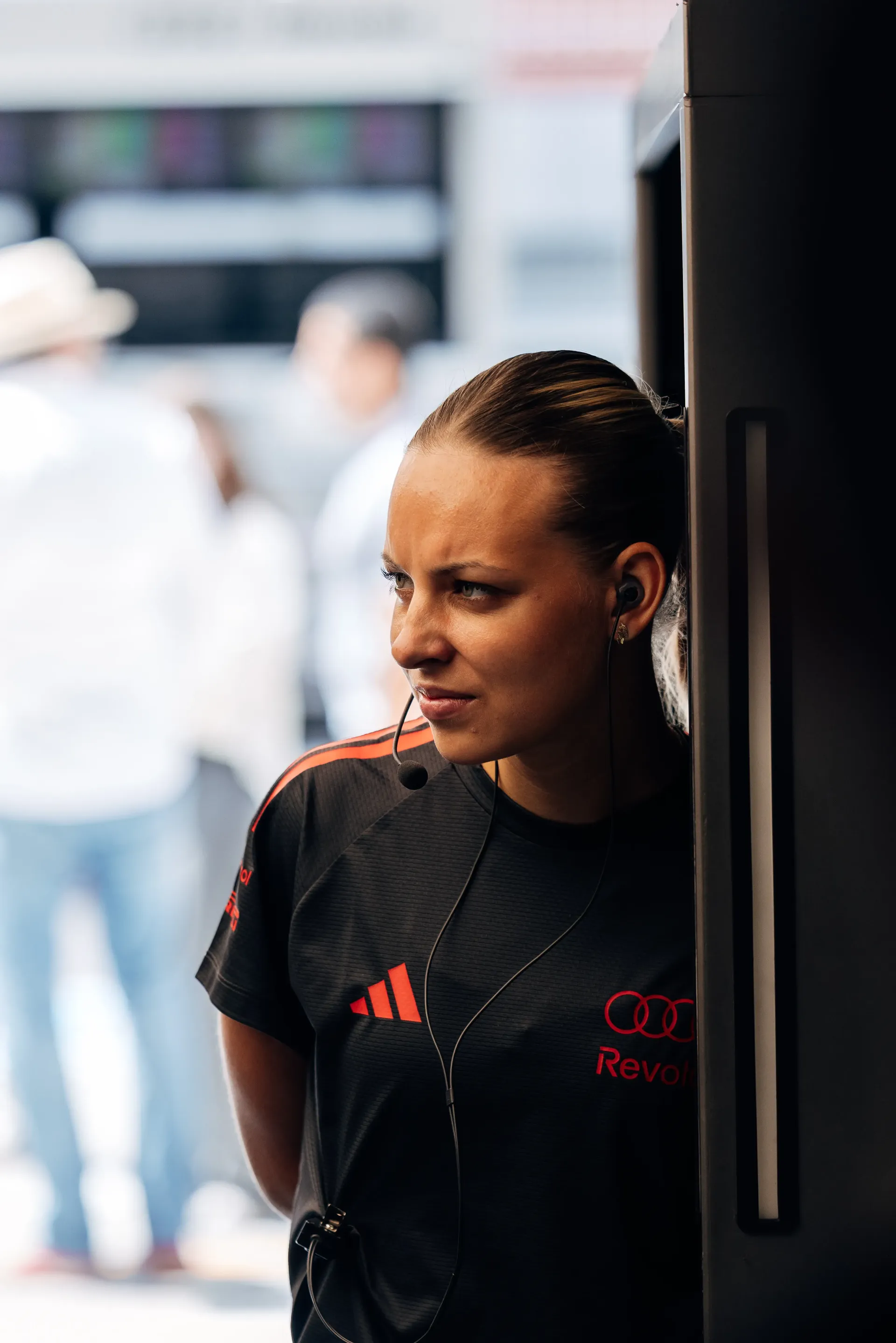 Audi Revolut F1® Team mechanicwatches the pit lane during Friday practice.