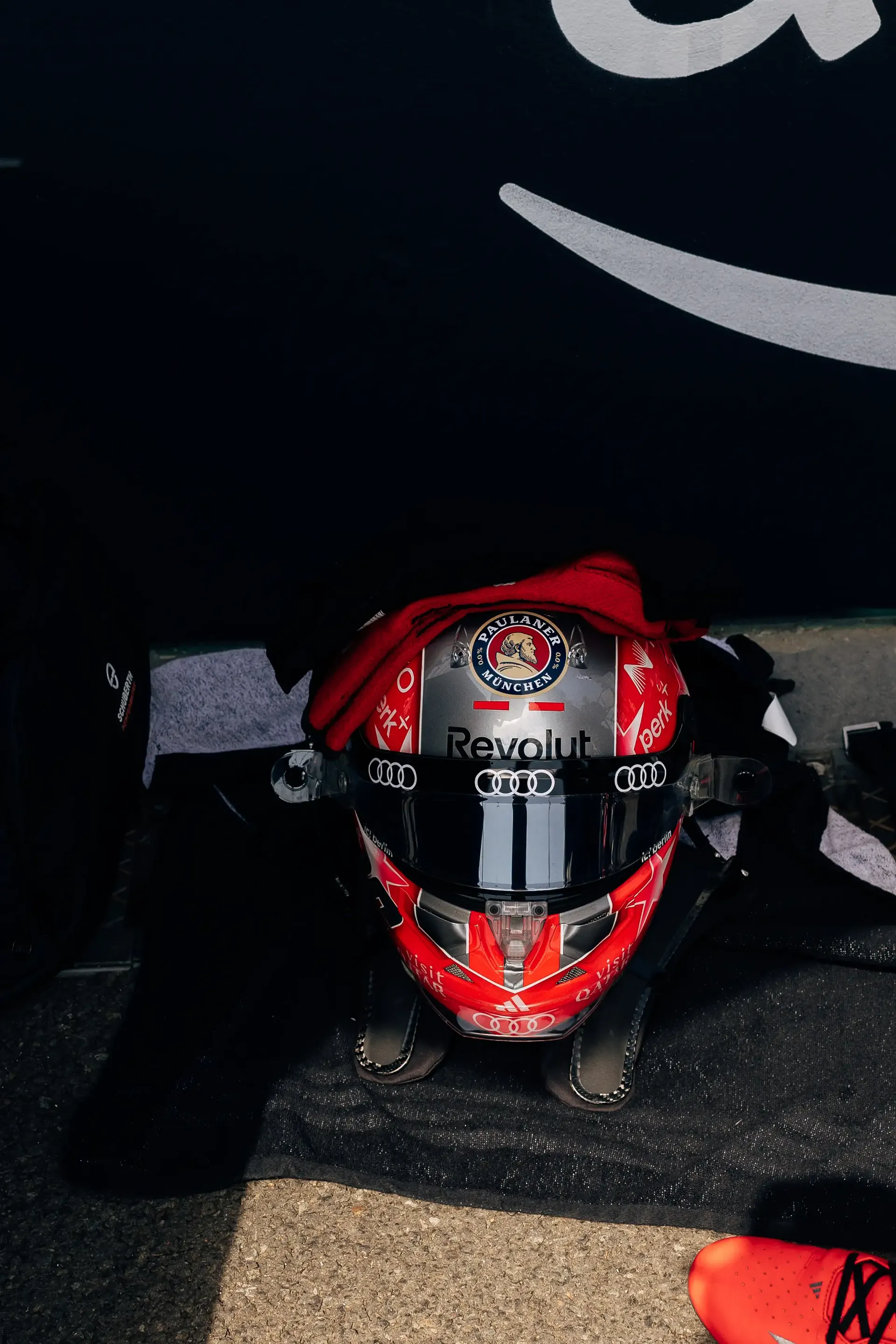 Helmet of an Audi Revolut F1® Team driver resting inside the garage before the Hungarian Grand Prix, viewed from above.