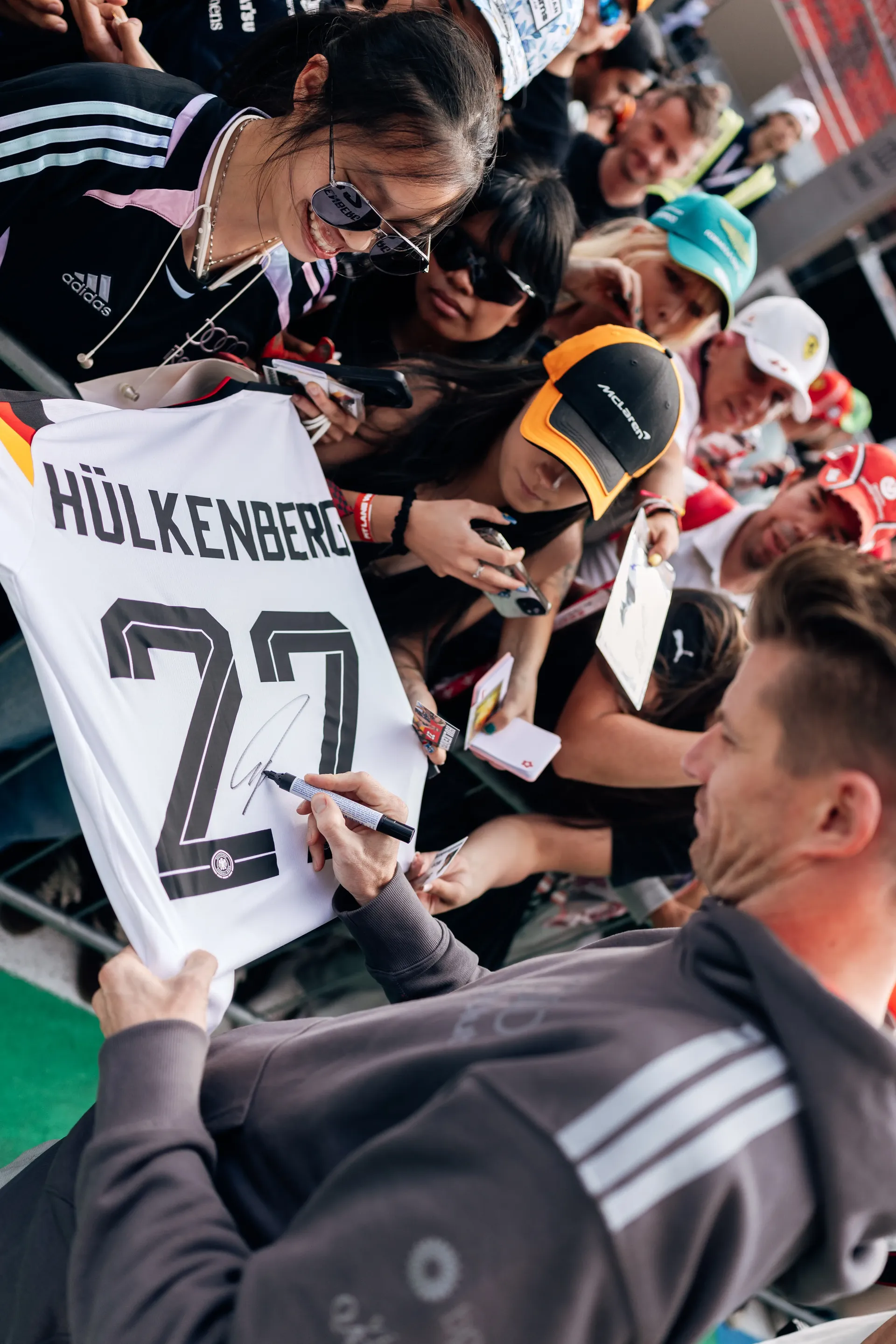 Audi Revolut F1® Team driver Nico Hulkenberg signs autographs for fans at the Hungaroring ahead of FP1.
