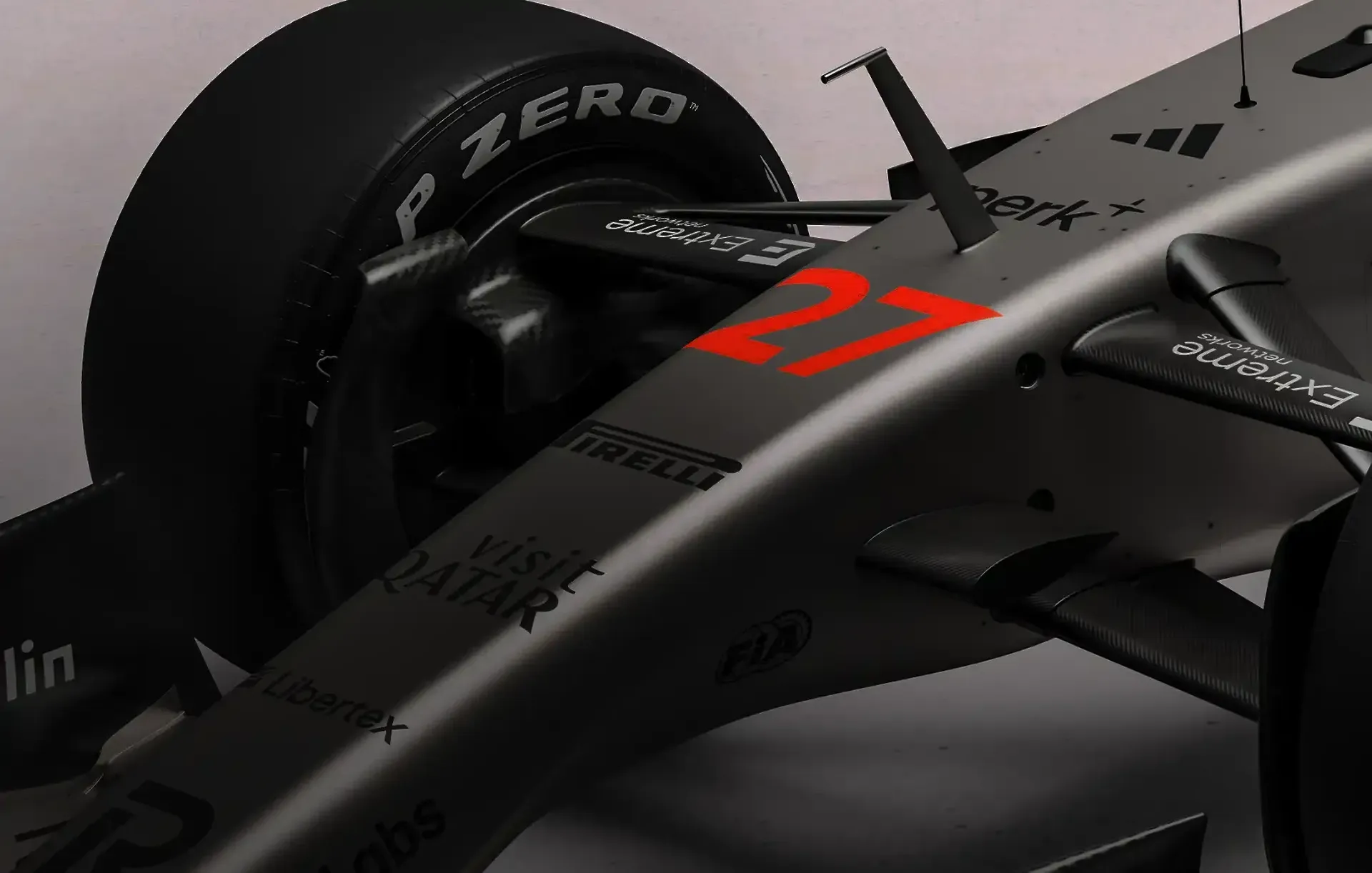 Partner logos Adidas, Perk, Pirelli on the R26 nose area of the car