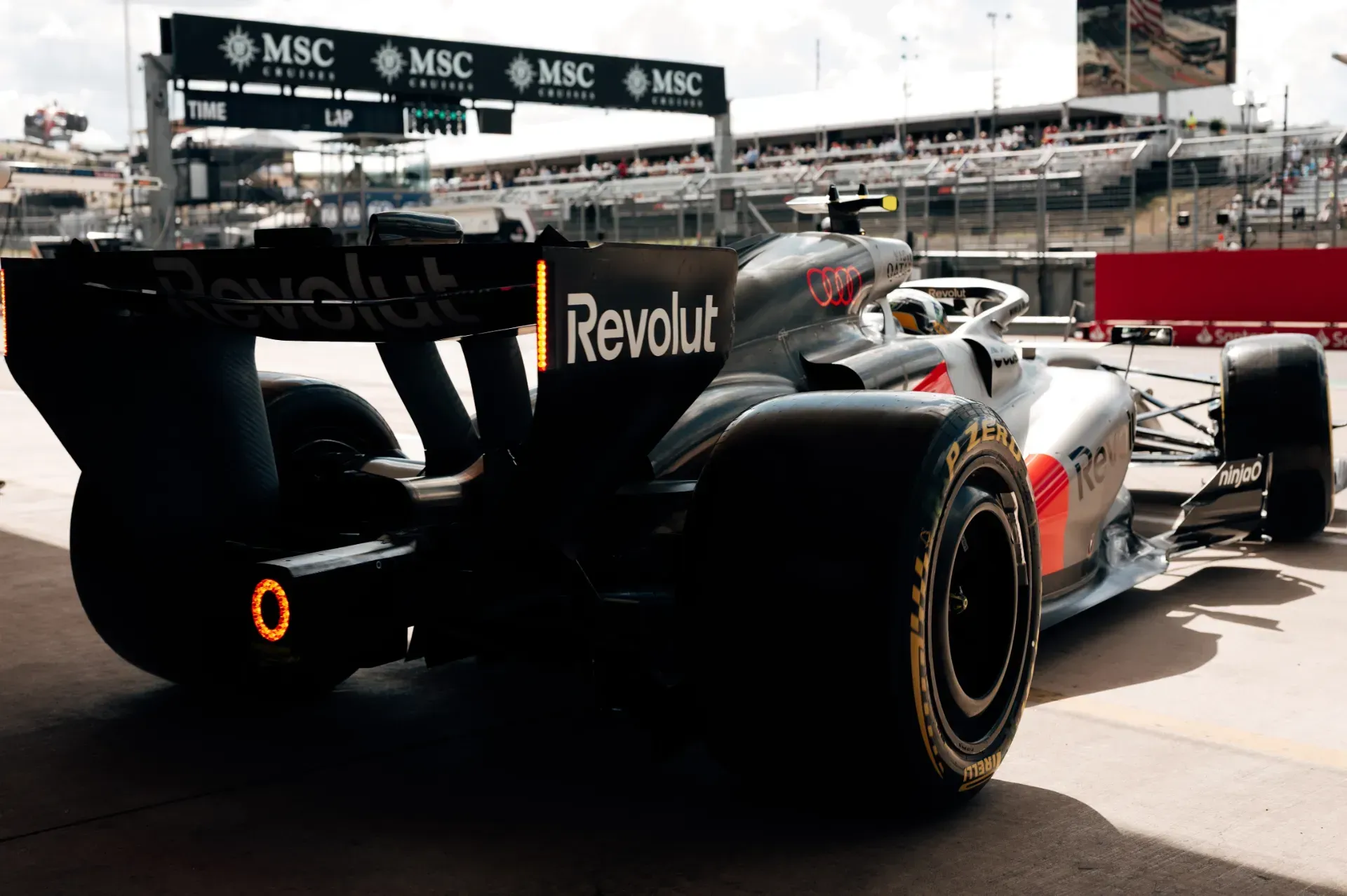 Car of the Audi Revolut F1® Team with Revolut rear wing and Pirelli tyres in the pit lane in Austin