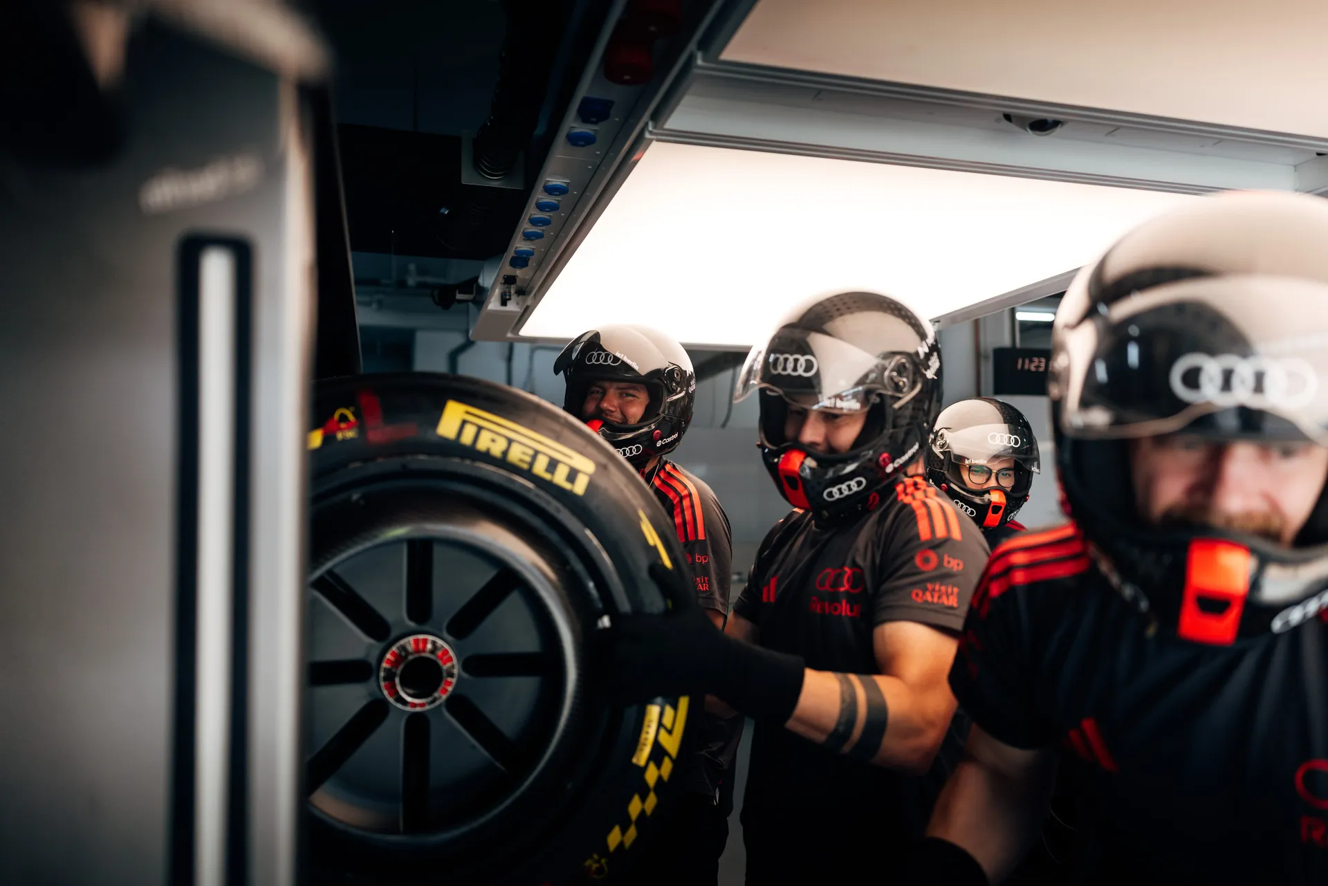 Audi Revolut F1® Team mechanics preparing the Audi R26