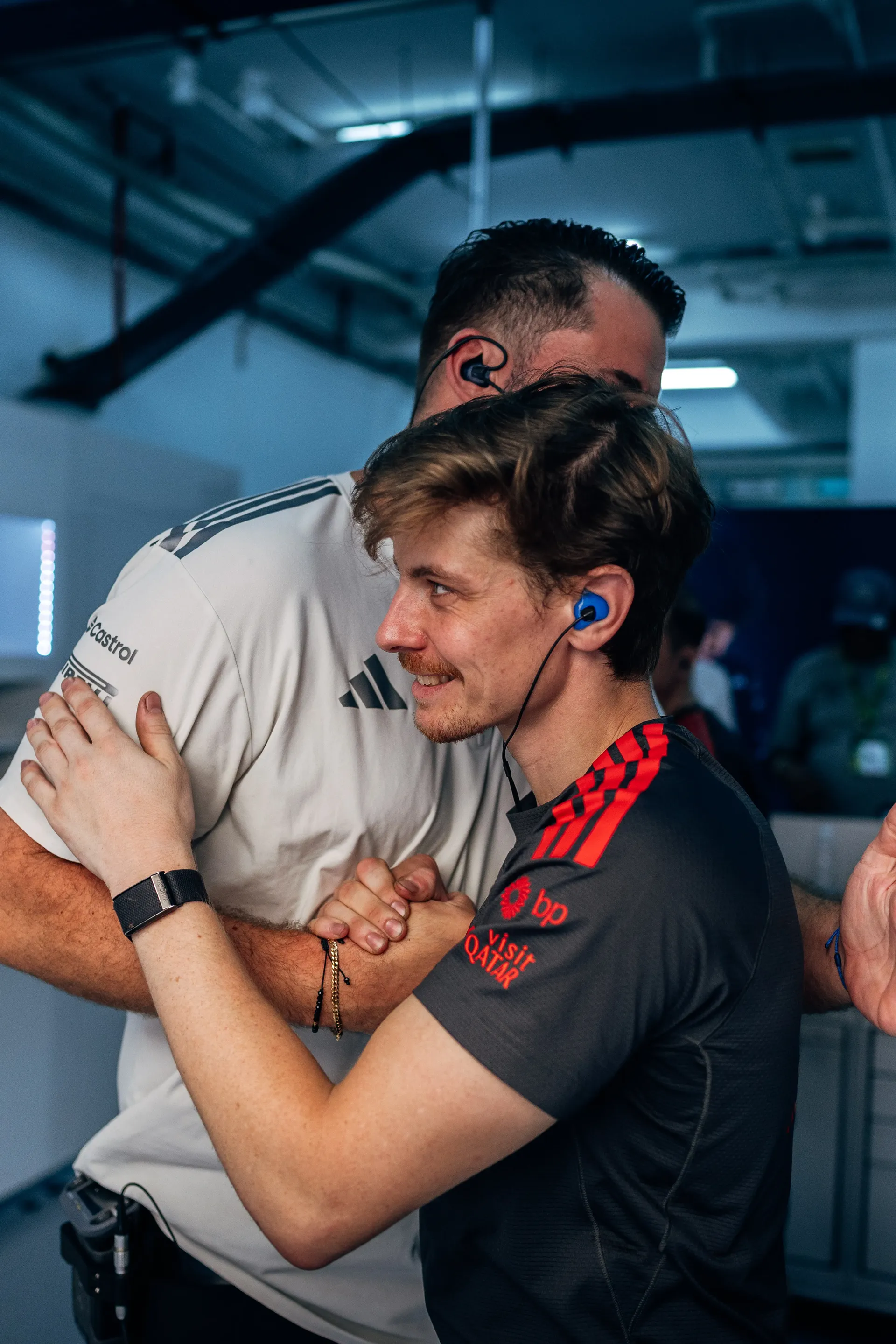 Audi Revolut F1® Team team mechanics celebrating in the garage