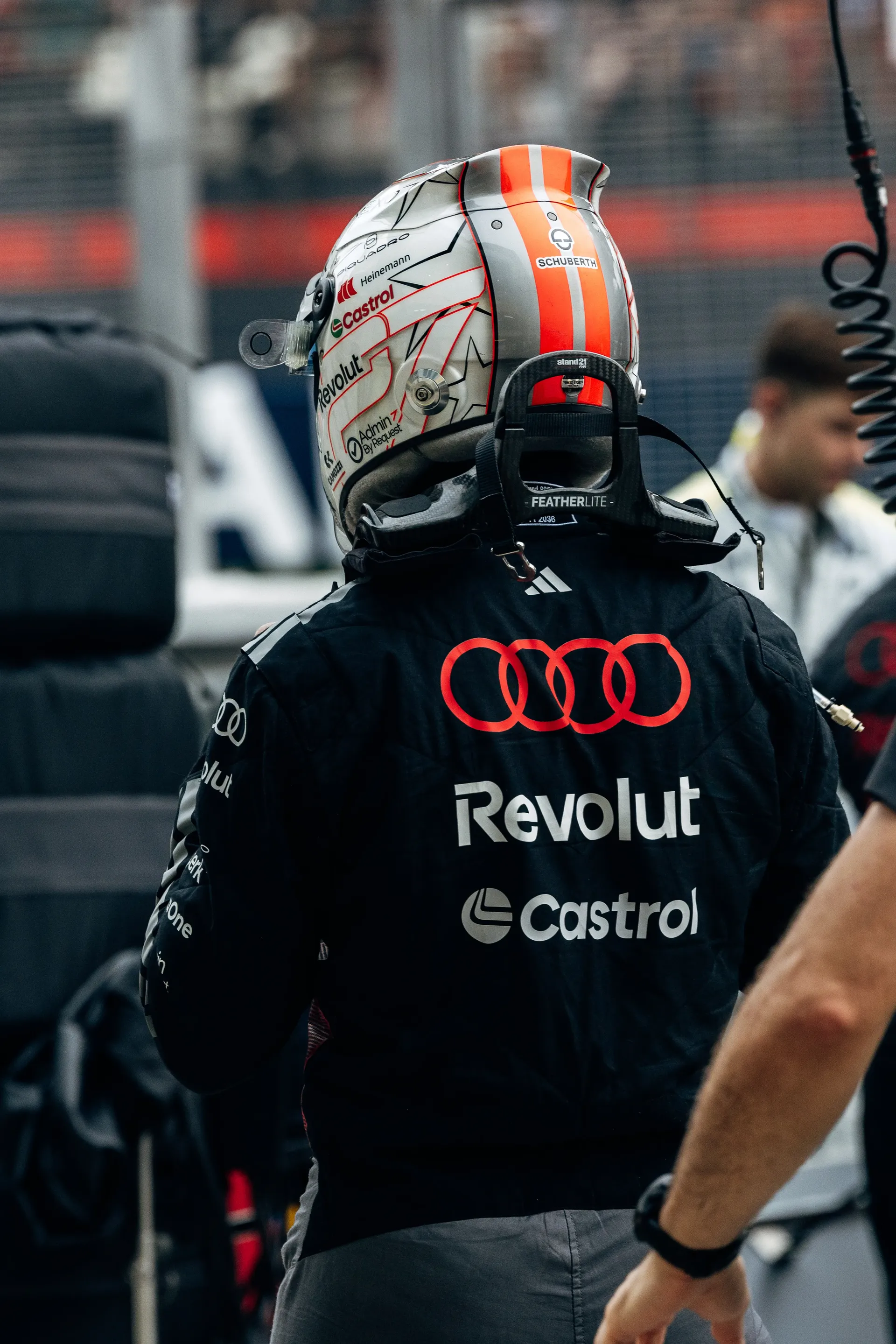 Audi Revolut F1® Team driver Nico Hulkenberg walking through the paddock
