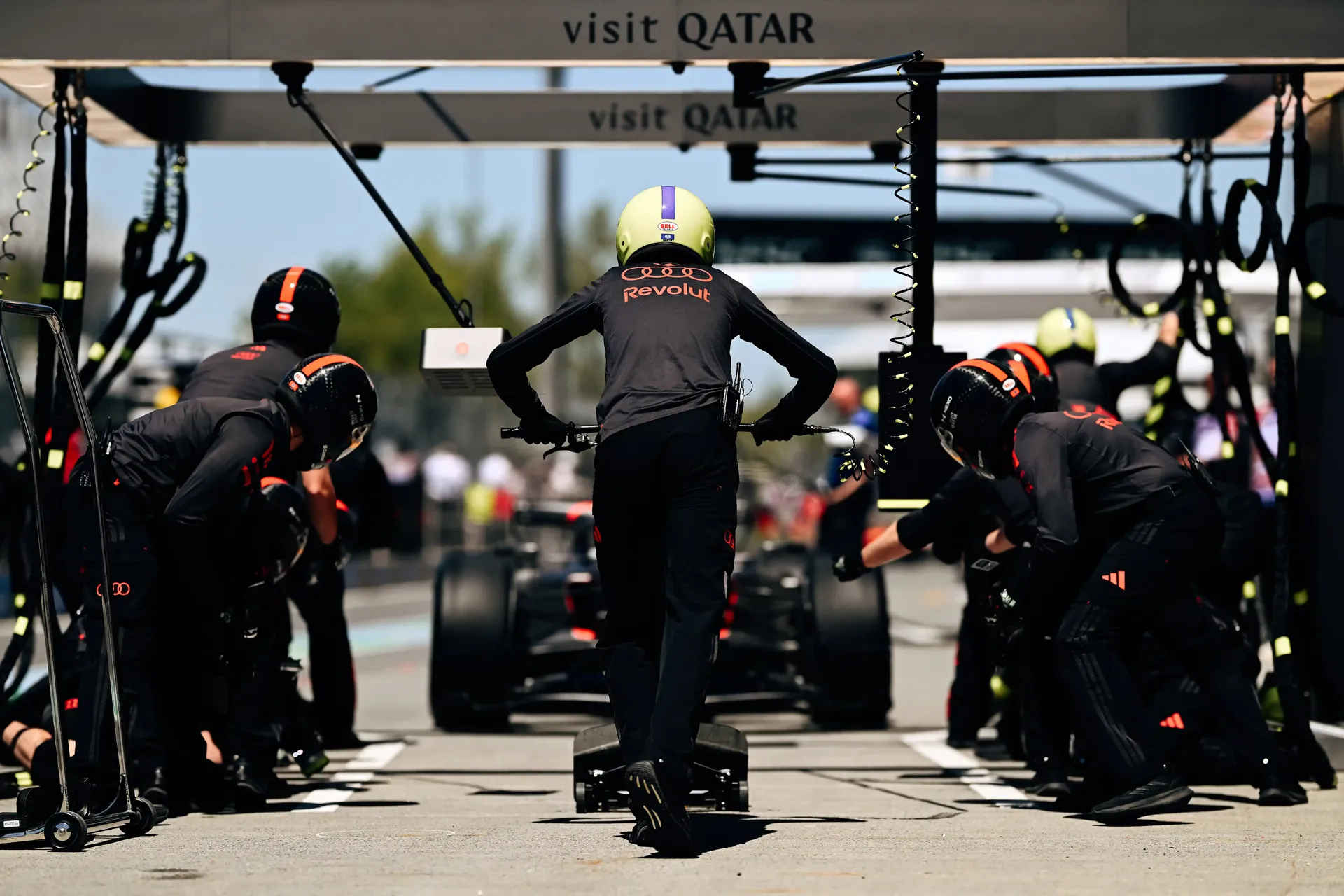 Audi Revolut F1® Team car surrounded by crewmembers and mechanics at the pitstop during the Canada Grand Prix 2026