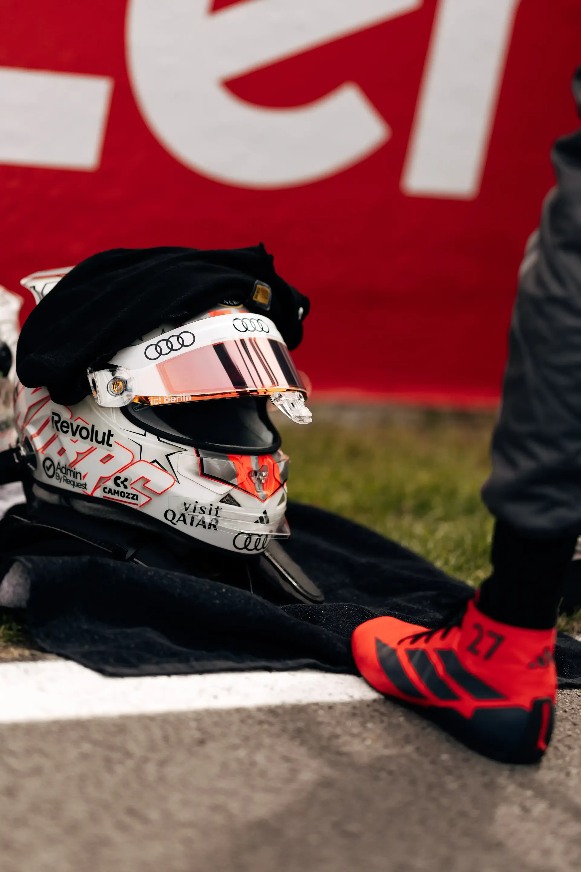 Close up of Nico Hulkenberg driver of the Audi Revolut F1® Team sitting at the side lane, wearing his helmet at the Canada Grand Prix 2026