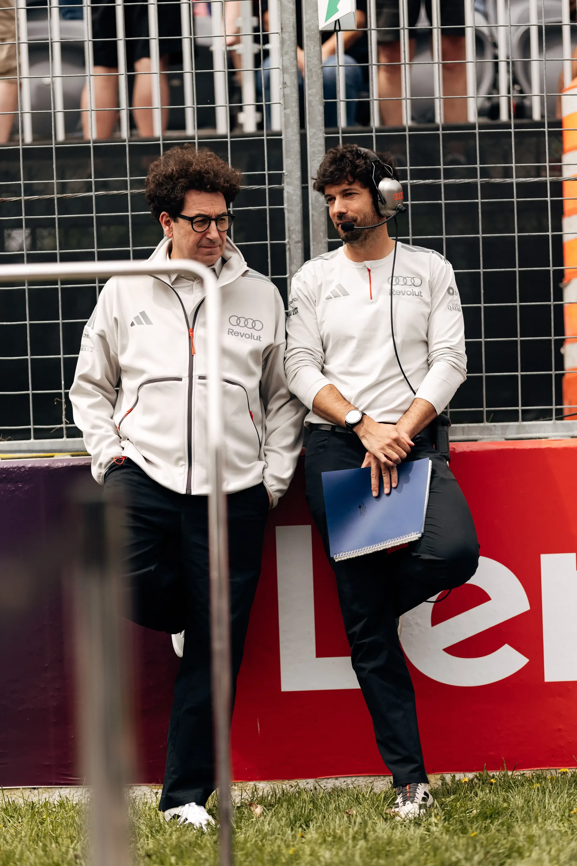 Team principal Mattia Binotta of the Audi Revolut F1® Team standing with crew member at the side lane of the Canada Grand Prix 2026