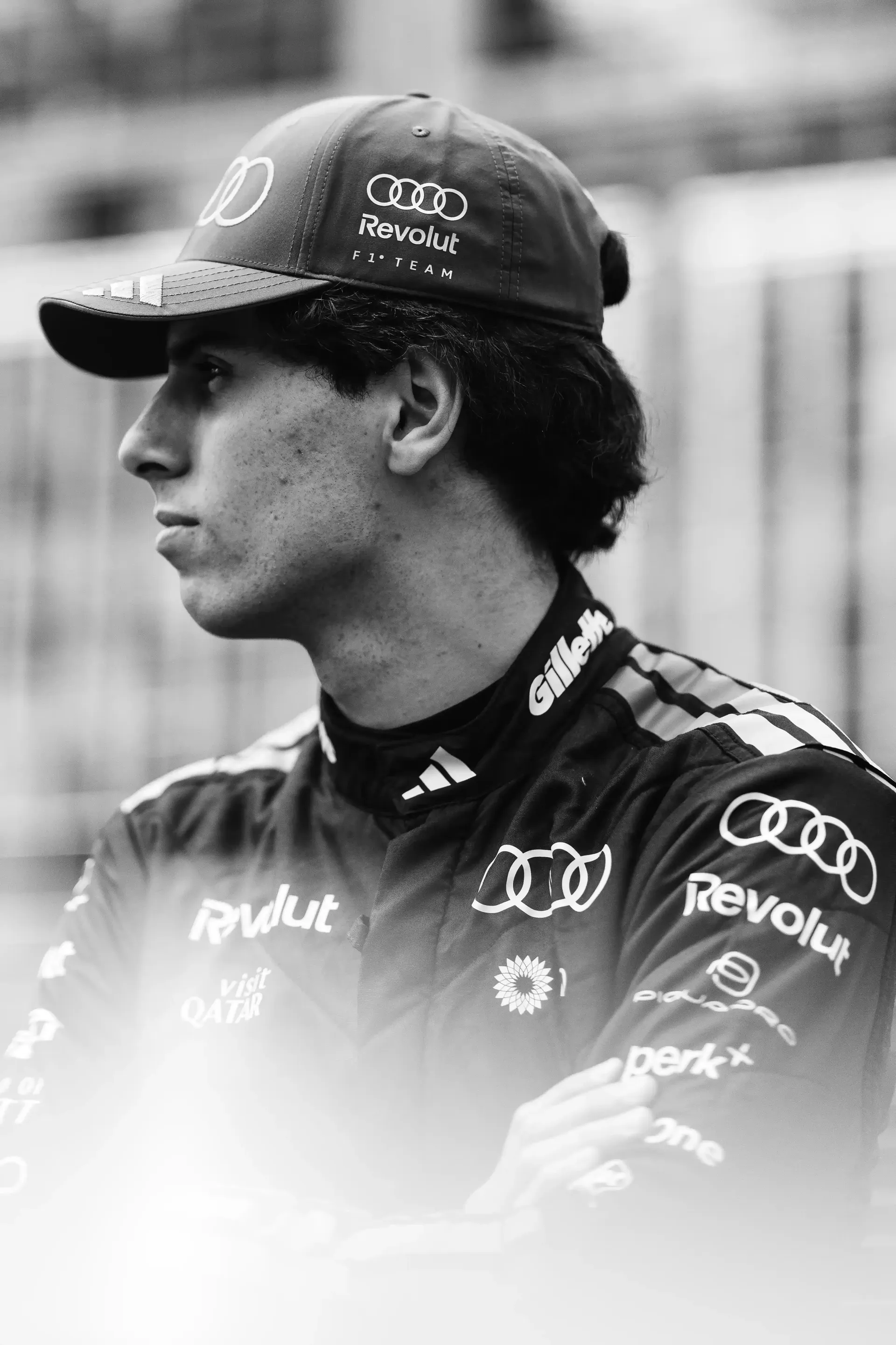 Black and White shot of Gabriel Bortoleto driver at the Audi Revolut F1® Team standing at the side lane of the Circuite Gilles VIllneuve at the Canada Grand Prix 2026