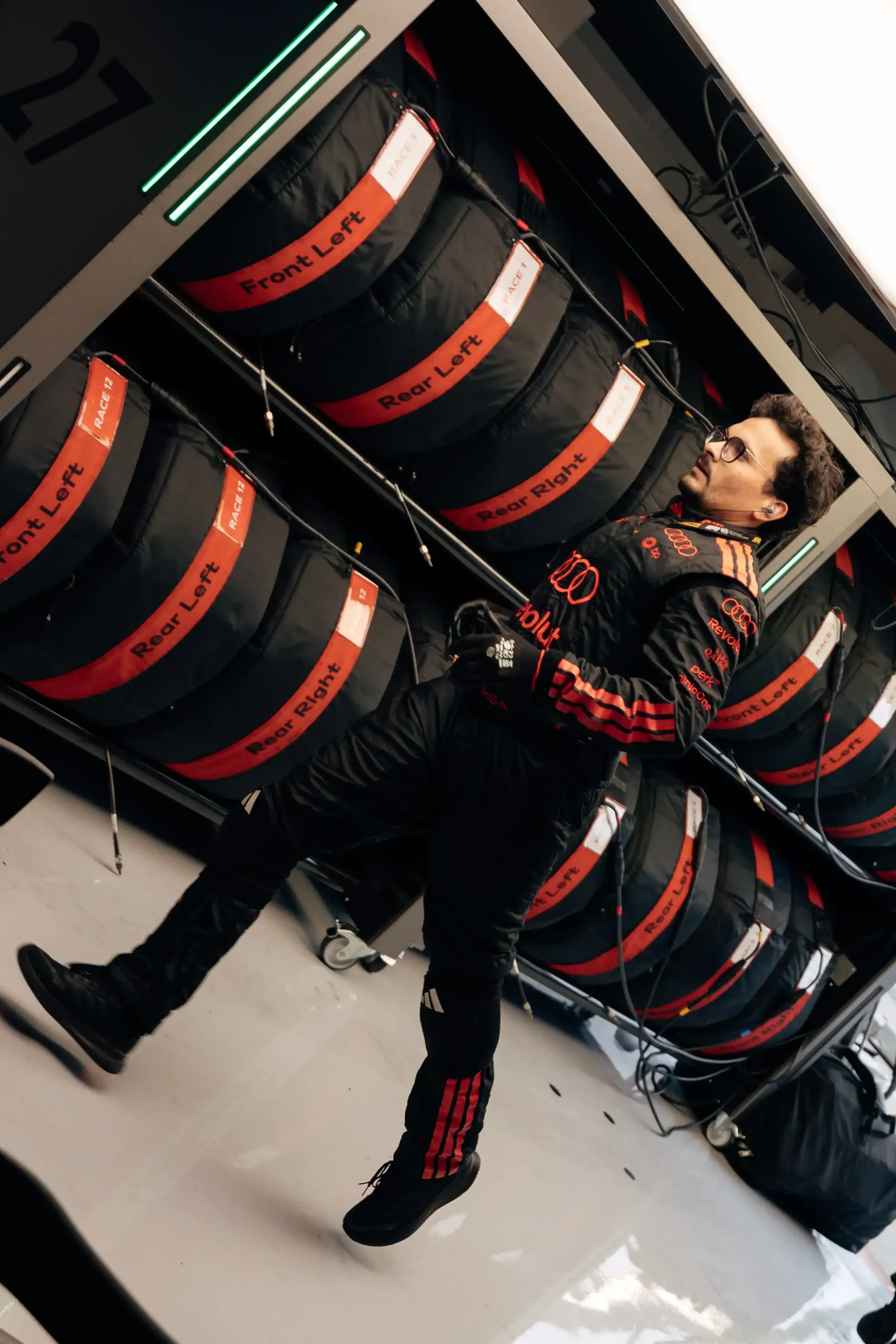 Close up of Audi Revolut F1® Team mechanic running inside the garage at the Canada Grand Prix 2026