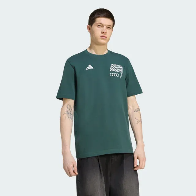 Model in a green chequered flag T-shirt, adidas x Audi Revolut F1® Team Sampa Soul collection