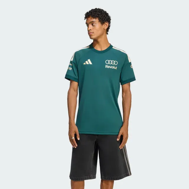 Model in a green Revolut team jersey, adidas x Audi Revolut F1® Team Sampa Soul collection
