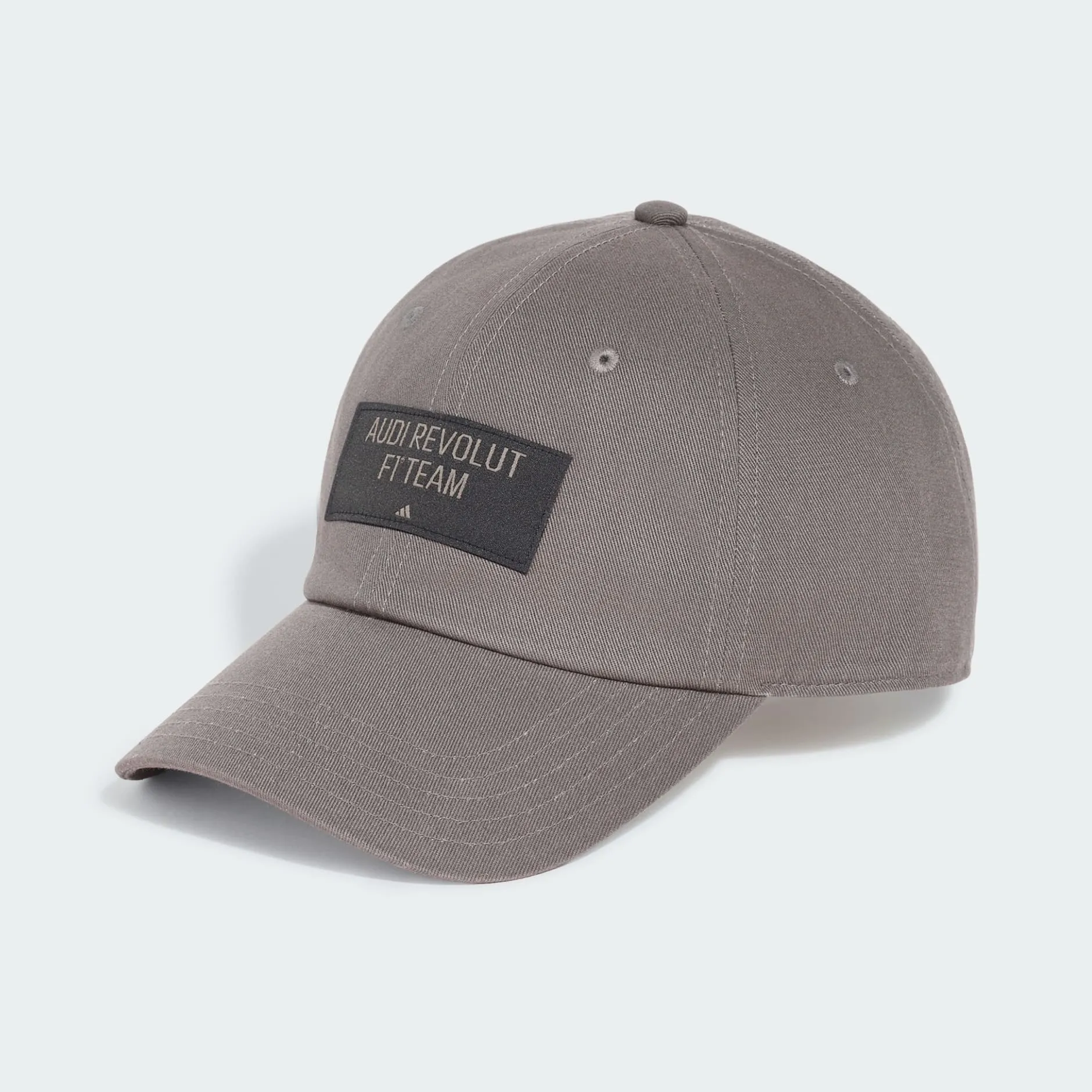 Front shot of the first adidas x Audi Revolut F1® Team collection cap in the Studio